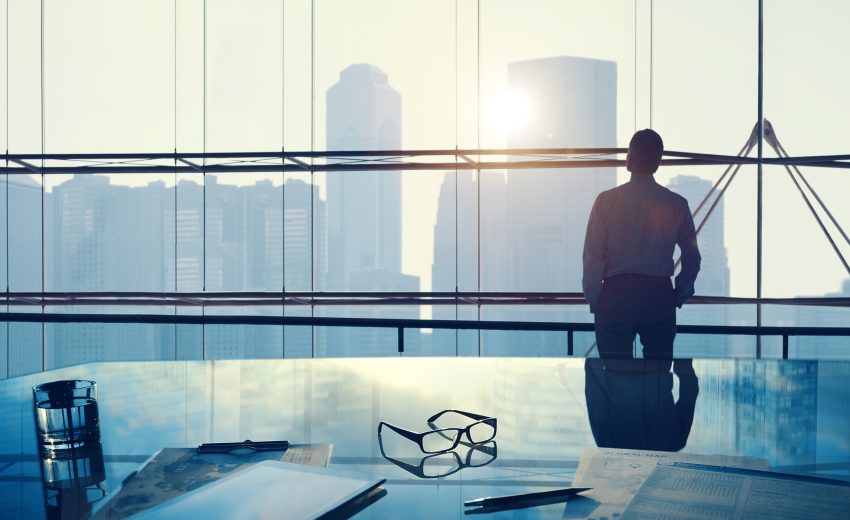 Businessman in a big office